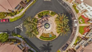 Aerial View Of Roundabout With Circular Fountain And Palm Trees