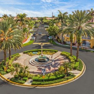 Aerial View Of Roundabout With Circular Fountain And Palm Trees